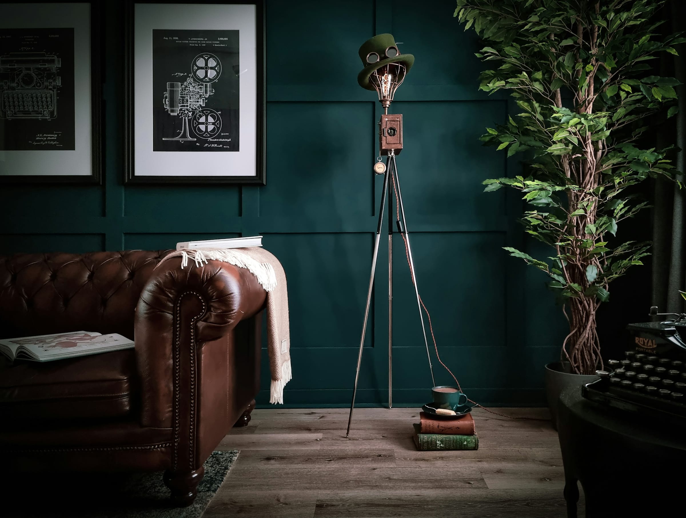 A richly painted deep-teal feature wall in a refined living space.